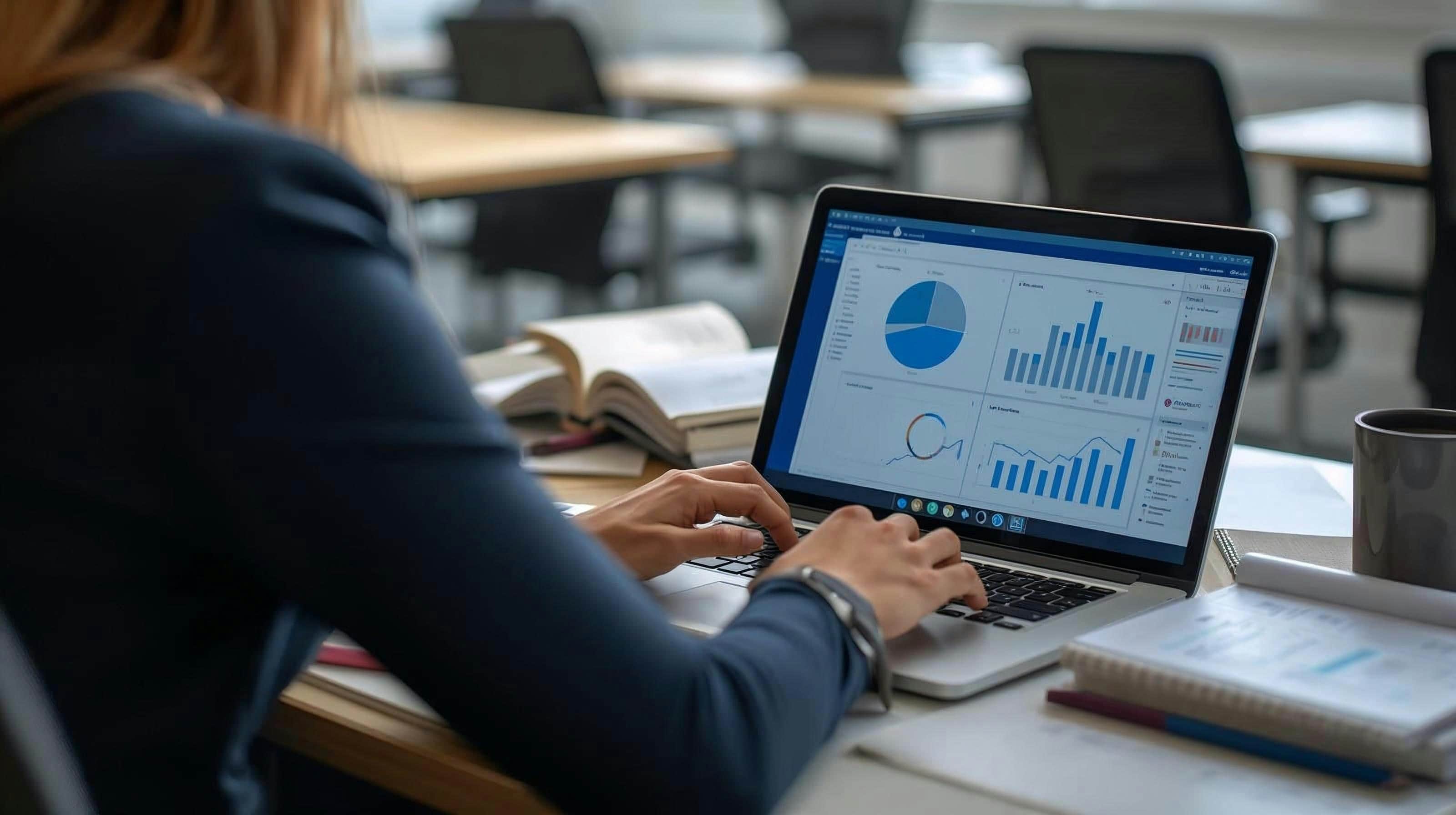 Team member reviewing retail analytics dashboard on a laptop