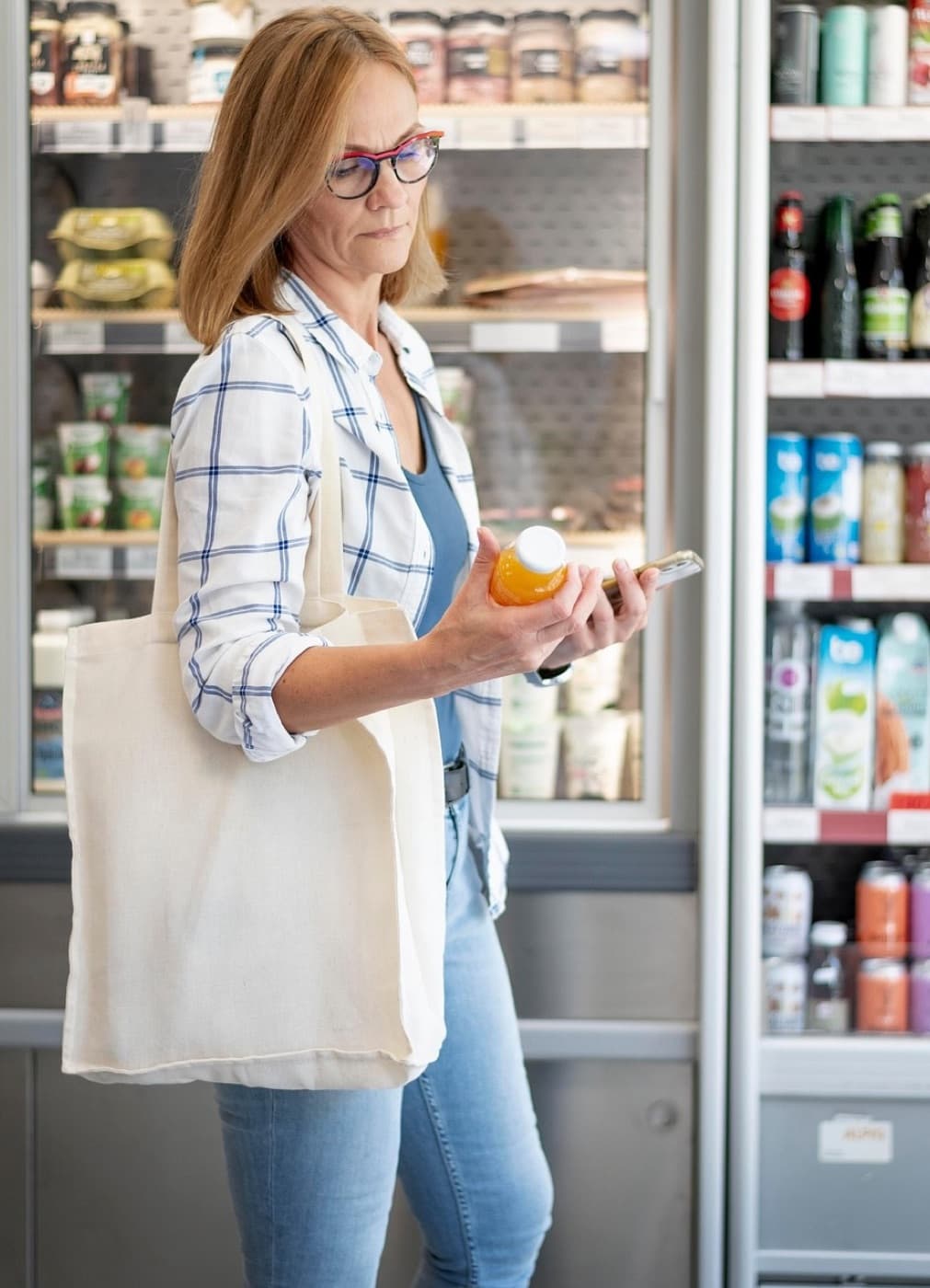 Shopper checking a product label at Walmart